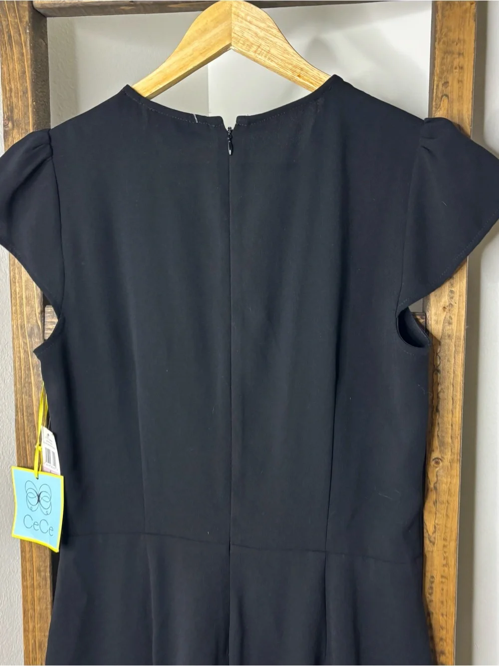 CeCe Black Short Sleeve Wrap Jumpsuit Size 6